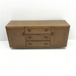 Ercol light elm sideboard, three drawers flanked by two cupboards, E156cm, H69cm, D47cm