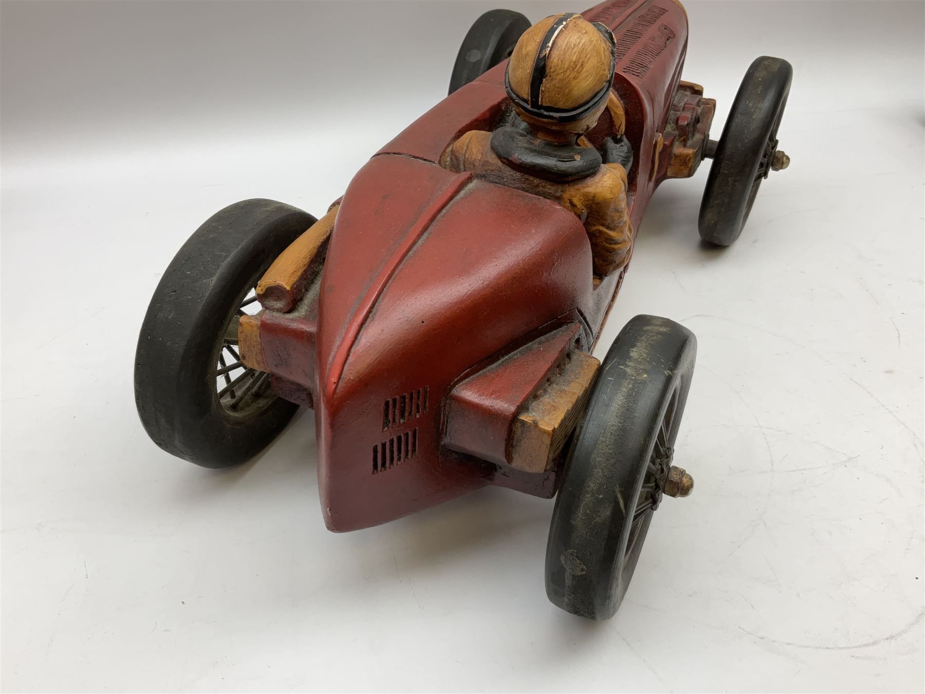 Four Franklin Mint Precision Models, one with hardwood body; large reproduction model of a vintage racing car L52cm; and four other modern metal/wooden models of vintage cars; all unboxed (9)