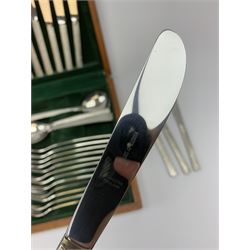 A canteen of bark effect stainless steel cutlery by Gerald Benney for Viners Studio, in a teak case. 
