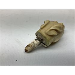 19th century carved ivory walking cane handle, modelled as the head of a greyhound with inset glass eyes, together with a further 19th century ivory example, modelled as a caricature of a gentleman's head, (2)