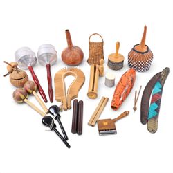 Collection of percussion instruments, including pair of metal maracas, cabasa, shekere, go...