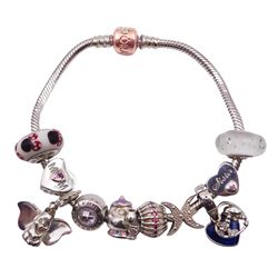Pandora silver bracelet with four Disney charms including Lady and the Tramp and Dumbo droplet charms, six other Pandora charms and a 14ct rose gold plated clasp