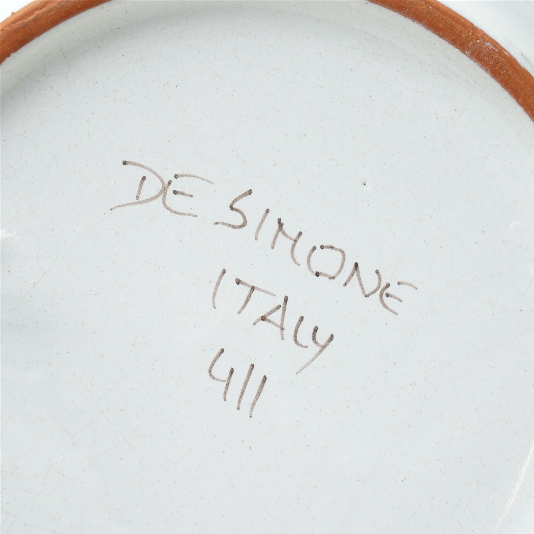 Giovanni DeSimone - two hand-painted mid-century plates, each incised and polychrome enamelled, signed to the front , larger plate D25cm