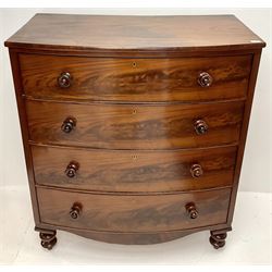 Victorian mahogany bow front chest, four graduating drawers, turned supports