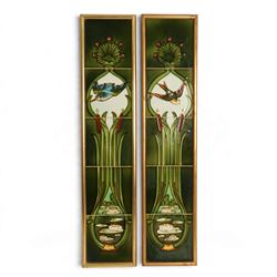 Pair of framed Art Nouveau fireside tile sets, each with five tube-lined tiles one depicti...
