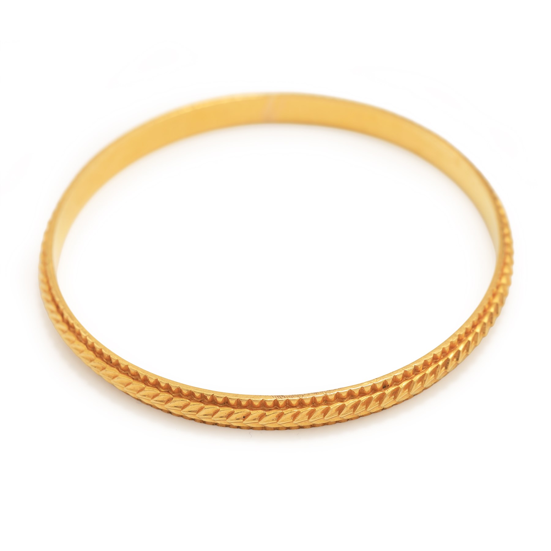 21ct gold bangle with engraved decoration