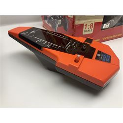 PMS Lightning 1:8 scale remote control racing car; Soma Sonic Man battery operated electronic sounds and light action figure; and CGL Galaxy Invader 10000 computer space battle game; all boxed (3)