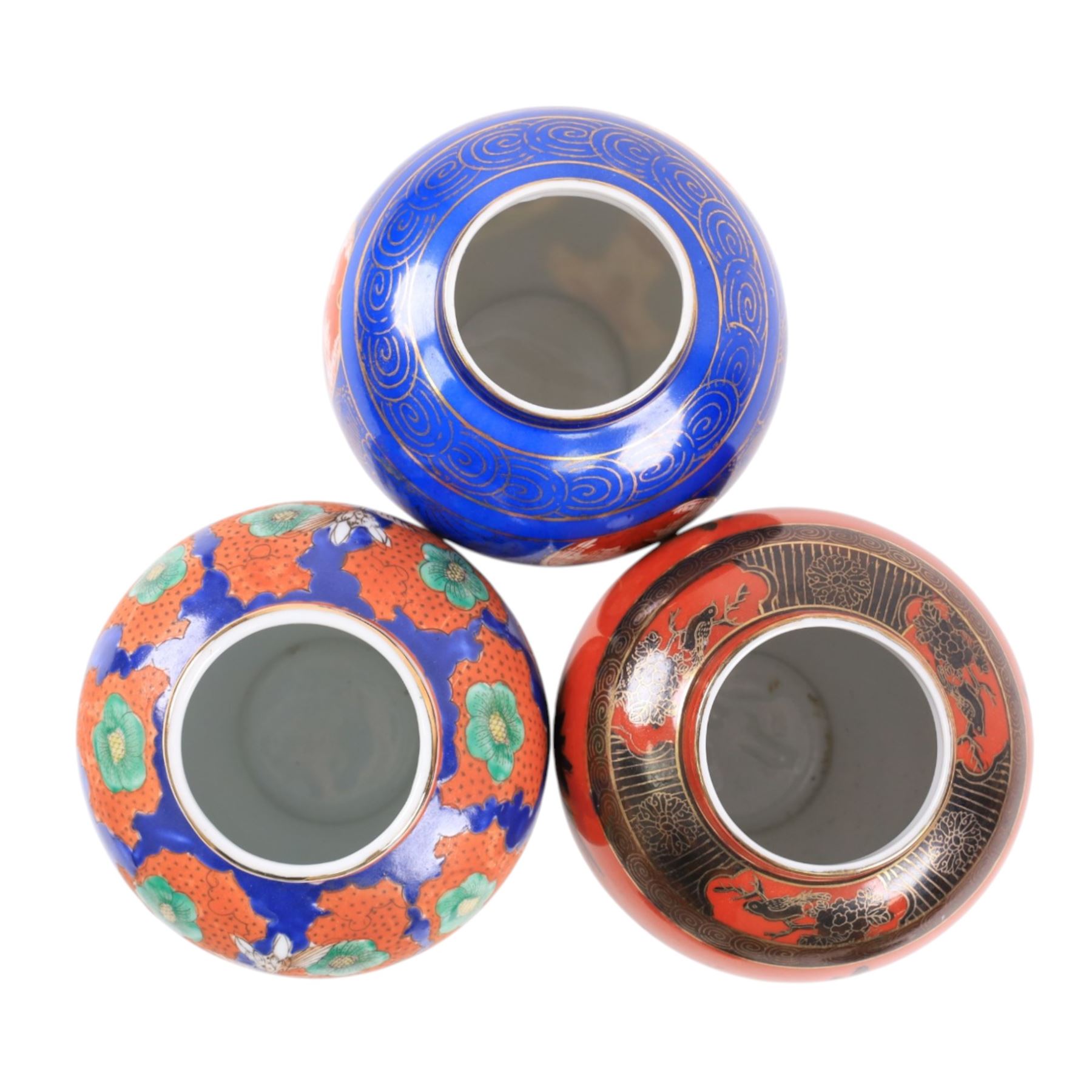 Three Chinese vases and covers, each decorated with floral sprigs, H24cm 