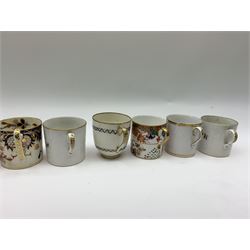 A Spode Bute shape teacup, together with together with two Spode coffee cans, each decorated in the Imari pallet, pattern 967, a 19th century Derby Imari pattern coffee can, two 19th century Derby cups decorated with blue and gilt bands, and three 19th century Bat printed coffee cans, probably Spode. 