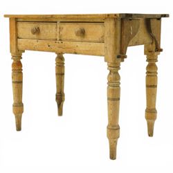 Victorian stripped pine table fitted with two drawers, supported on turned supports