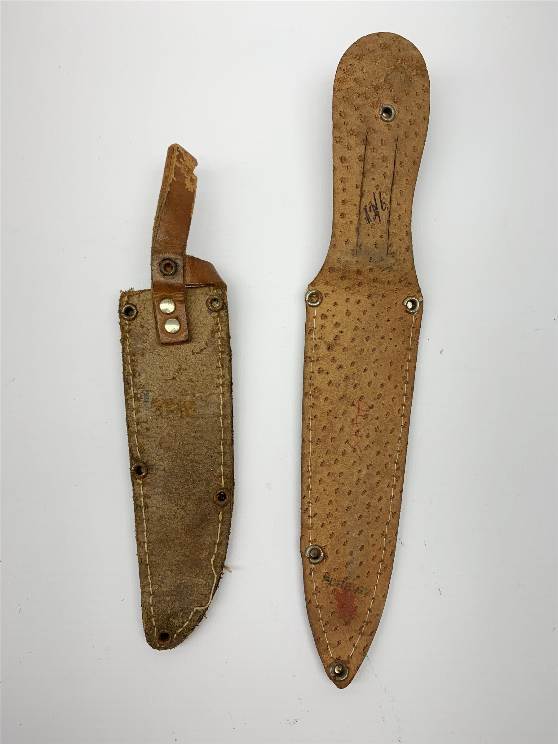 20th century hunting knife with 13cm single edge blade, cast white metal hilt with S-shaped quillon, wrythen grip and eagle head pommel L25cm overall; and another hunting knife with Solingen 12cm blade and simulated stag antler grip, both in leather sheath (2)