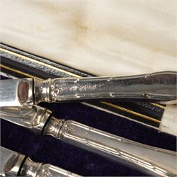 Set of six Australian silver coffee spoons each with a different terminal including Koala, Emu etc, Melbourne mint, cased and a set of six silver handles pastry knives, cased