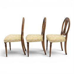 Bevan Funnell Reprodux - Regency design set of ten mahogany dining chairs, oval backs with central splat with rose motif, serpentine seat upholstered in damask fabric, raised on turned supports