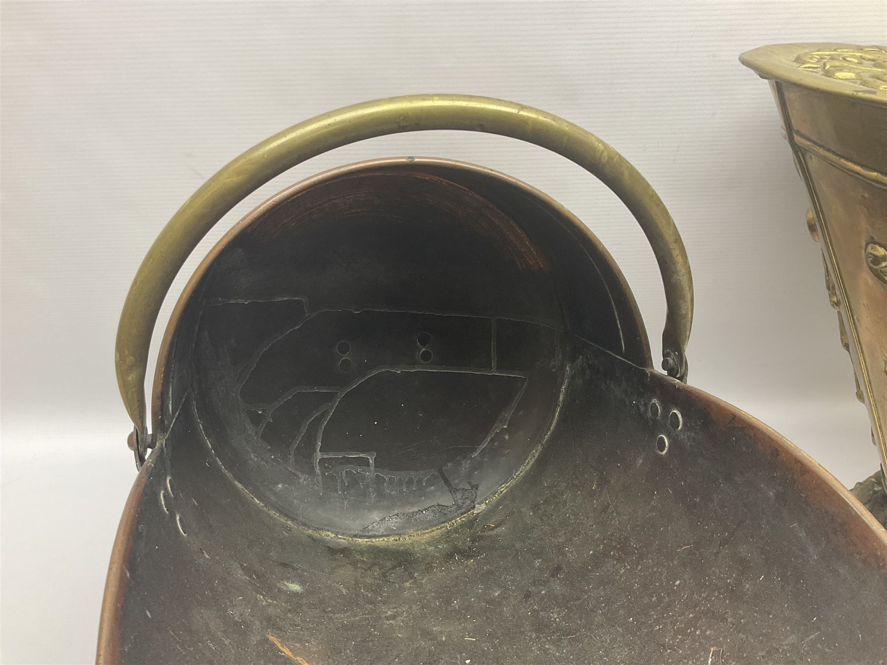 Victorian Benham & Froud Arts and Crafts brass coal scuttle, with Victorian diamond registration mark, together with a copper and brass scuttle of helmet form, tallest H50cm