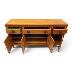 Lizardman - oak 5' sideboard, rectangular top over three panelled frieze drawers, fitted with two double panelled cupboards with wrought iron handles and locks, raised on tapered octagonal feet, with carved lizard signature, by Derek Slater of Crayke
