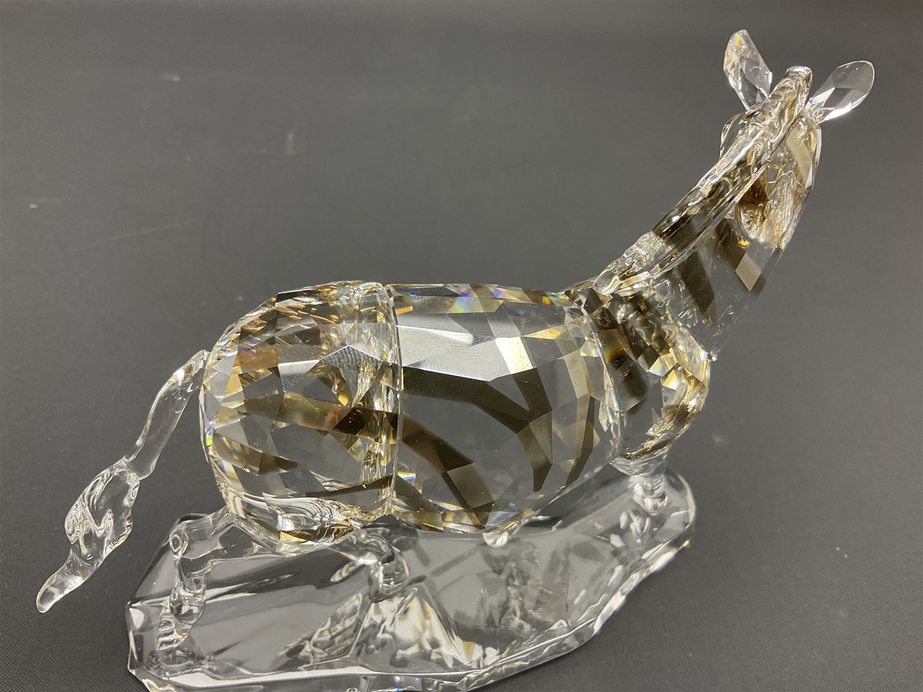 Swarovski Crsytal Society coloured animals, comprising zebra, giraffe and water buffalo, tallest H17.5cm