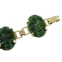 Gold oval link green/yellow hardstone mask bracelet, stamped 9ct