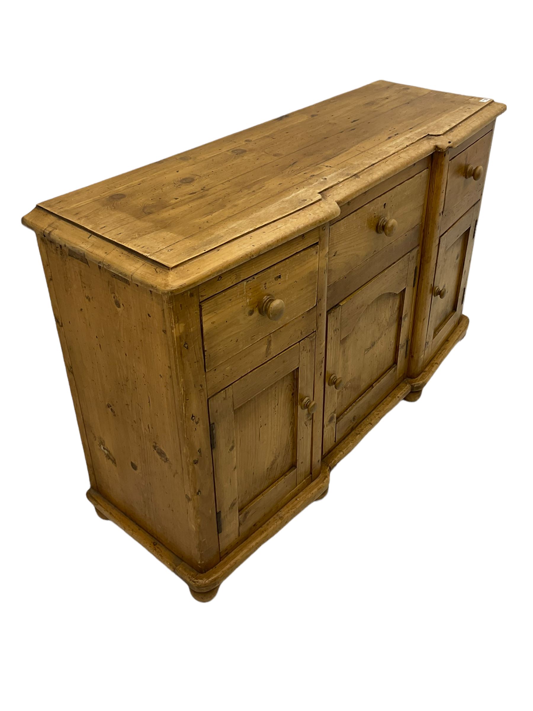 Stripped pine dresser, fitted with three drawers and three cupboards