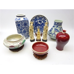  Contemporary Chinese ceramics comprising two blue and white vases, squat form bowl decorated with Ducks and water lilies, Sang de Boeuf style vase and bowl and three ivory style resin sages   