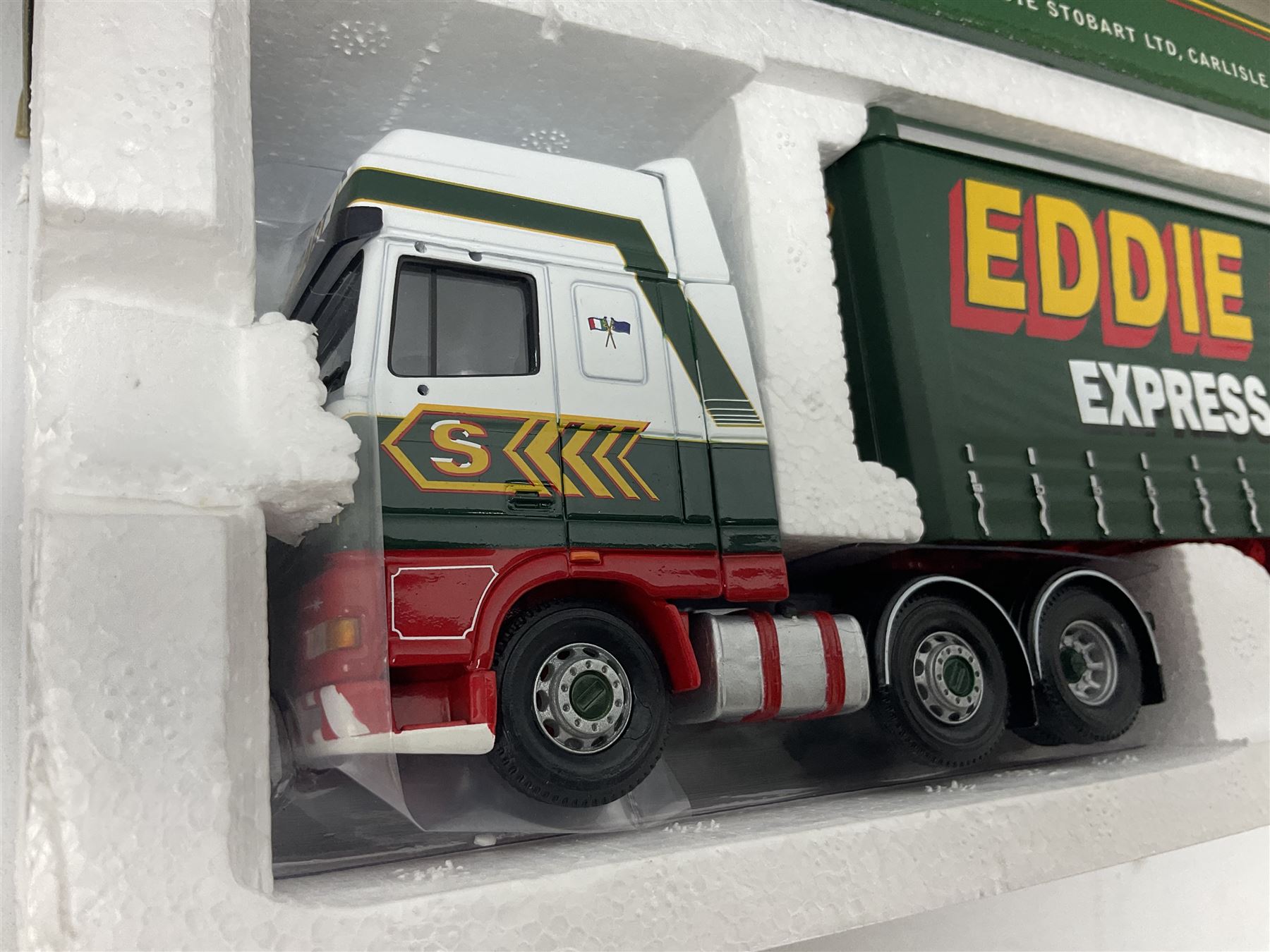 Corgi Eddie Stobart - three lorries; limited edition CC12802 Scania T-Cab Bulk Tipper; limited edition CC13201 DAF XF Super Space Cab Curtainside; and CC13401 MAN TGA Curtainside; all boxed (3)
