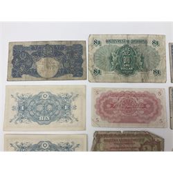 Banknotes including King George VI board of commissioners of currency Malaya one dollar 1st July 1941 'P/59 030908', Queen Elizabeth II Government of Hongkong one dollar 1st July 1952 'F/6 202153' etc