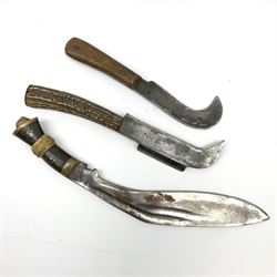 Two late 19th/early 20th century billhooks - one blade marked 'Brumby & Middleton' with Victoria cypher and antler grip L30.5cm, the other blade marked 'The Veteran Yates & Co Birmingham' with Calcutta retailer's mark to the ricasso and split wooden grip L26.5cm; together with an Indian kukri (3)