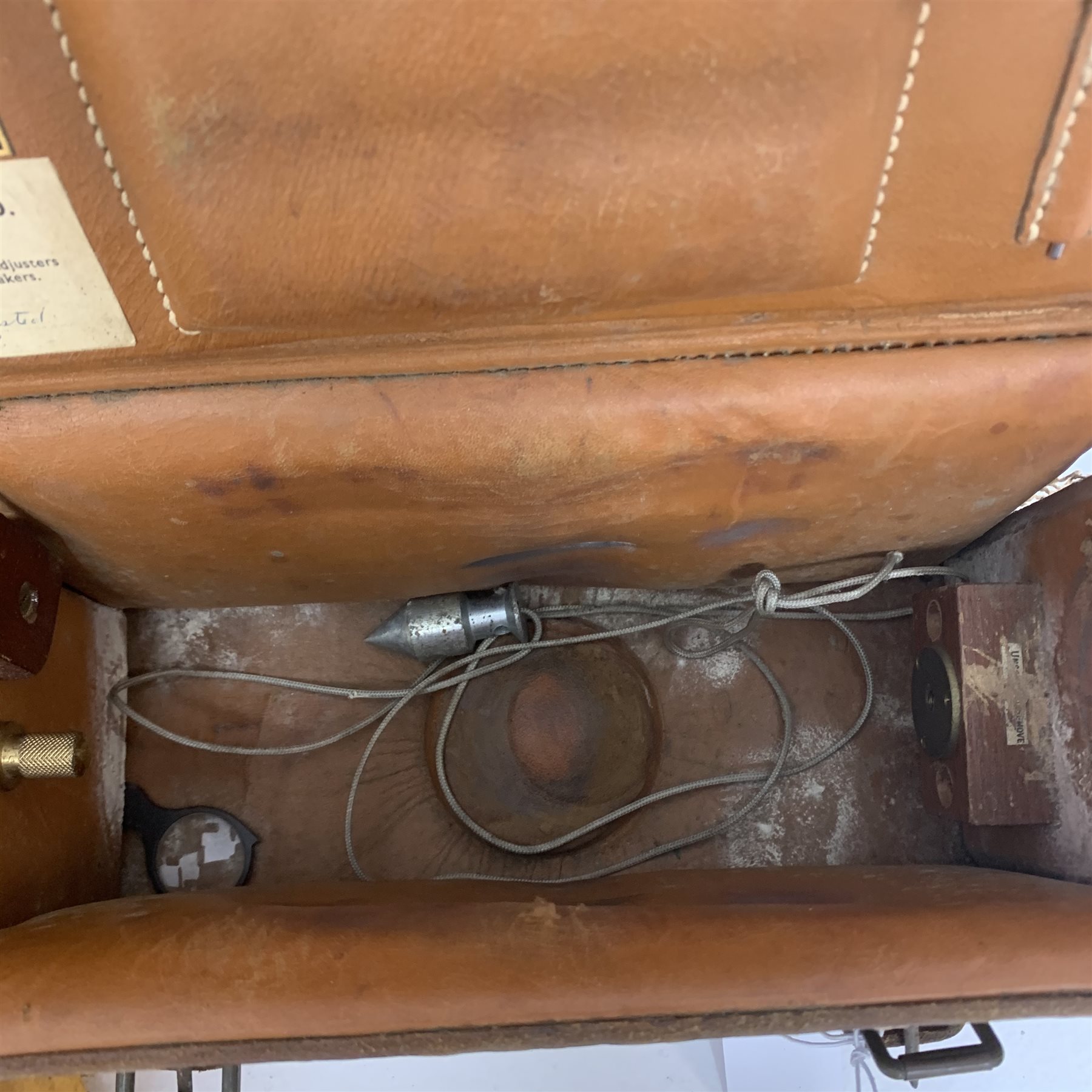 Carl Zeiss Theo 015B orange painted theodolite serial no.251267 in fitted case with accessories; E.R. Watts & Sons London level with black crackled body, serial no.1888, in calf leather carrying case; wooden folding tripod and telescopic measuring staff (4)