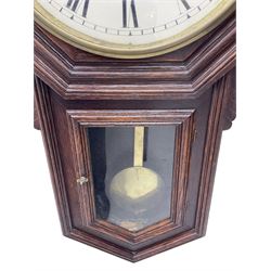 American - late 19th century 8-day drop dial wall clock, with a 12” dial and moulded hexagonal dial bezel, painted dial with roman numerals, minute track, steel spade hands and spun brass bezel, with a glazed case door and visible pendulum, eight-day spring driven movement striking the hours and half-hours on a coiled gong. With key.