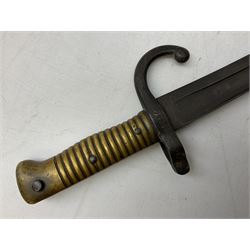 French Model 1866 sabre bayonet with 57cm fullered steel curving blade; in steel scabbard L71cm overall; another Model 1866 sabre bayonet lacking scabbard; and British Pattern 1856 sword bayonet (no scabbard) (3)