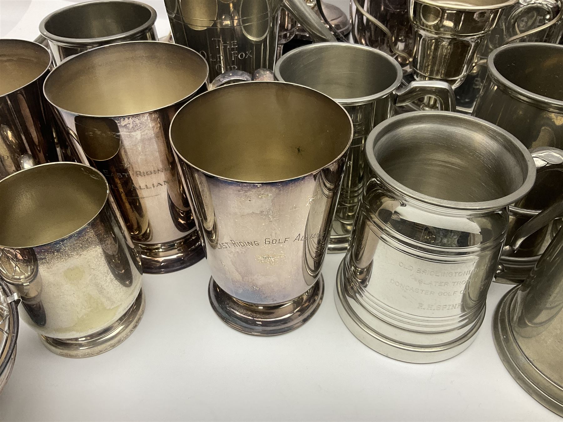 Collection of pewter and silver-plated trophy cups and presentation tankards, largest H28cm
