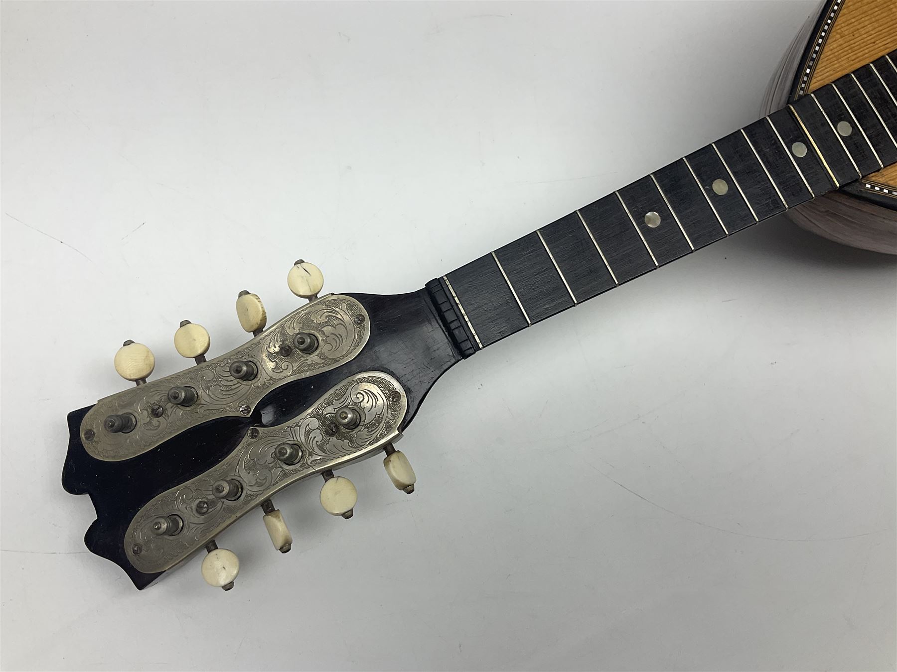 French mandolin with segmented lute back and mother-of-pearl inlaid spruce top; bears label for 'Jerome Thibouville-Lamy & Cie Paris L60cm; and another unmarked flat-back mandolin; both for completion (2)