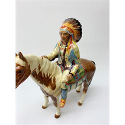 A Beswick Native American on horseback, with printed mark beneath, H21.5cm. 