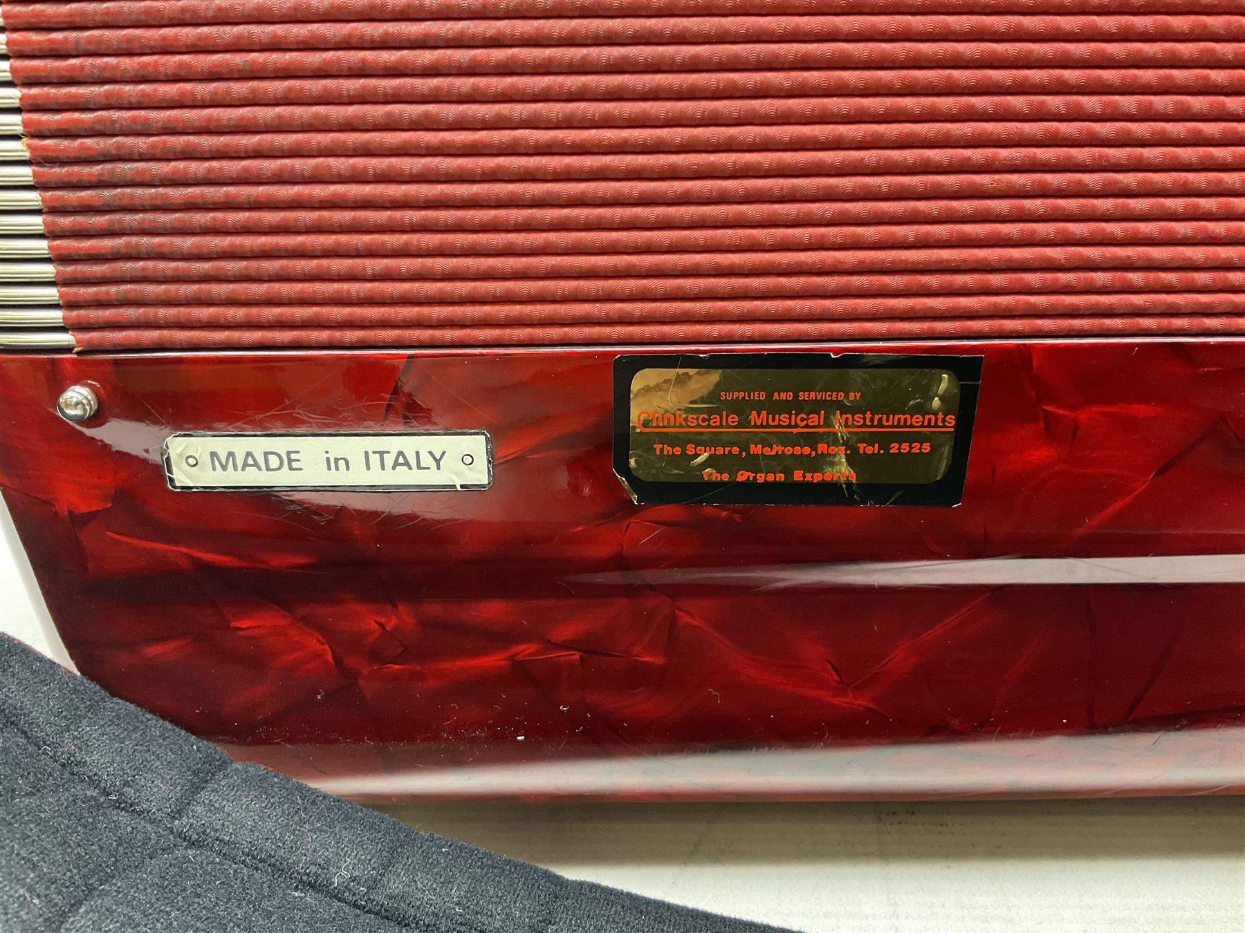 Clinkscale Crucianelli piano accordion in red pearline case with one-hundred and twenty buttons and forty-one keys L52cm; in carrying case