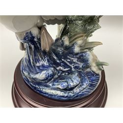 Large Lladro figure group, Swans Take Flight, modelled as two swans upon raised on circular wooden plinth, sculpted by Salvador Debon, H68cm
