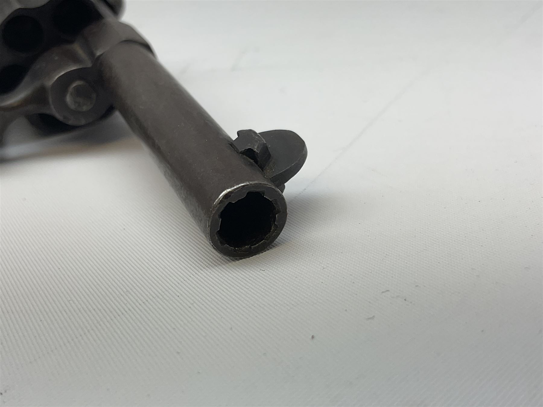 19th century Belgian Flobert 7mm pin-fire revolver with six-shot cylinder, 7cm octagonal to round barrel, folding trigger and walnut stock incorporating ejector rod in butt L18cm overall