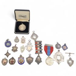 Collection of early 20th century and later silver fob medallions, including enamelled exam...
