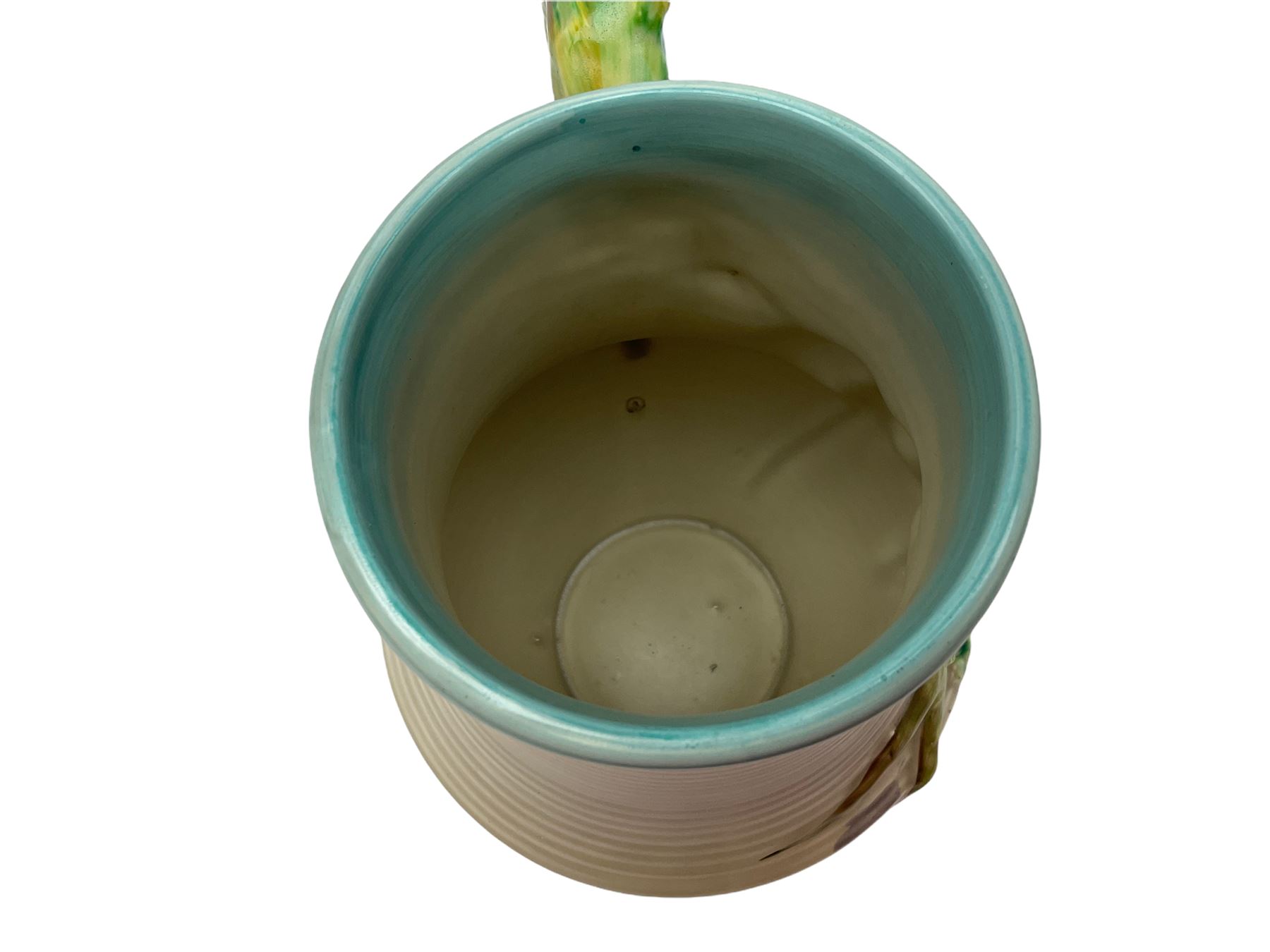 Clarice Cliff baluster jug moulded with a blue budgerigar perched upon branch with green rustic handle and mushroom glaze,  factory stamped beneath, H22.5cm