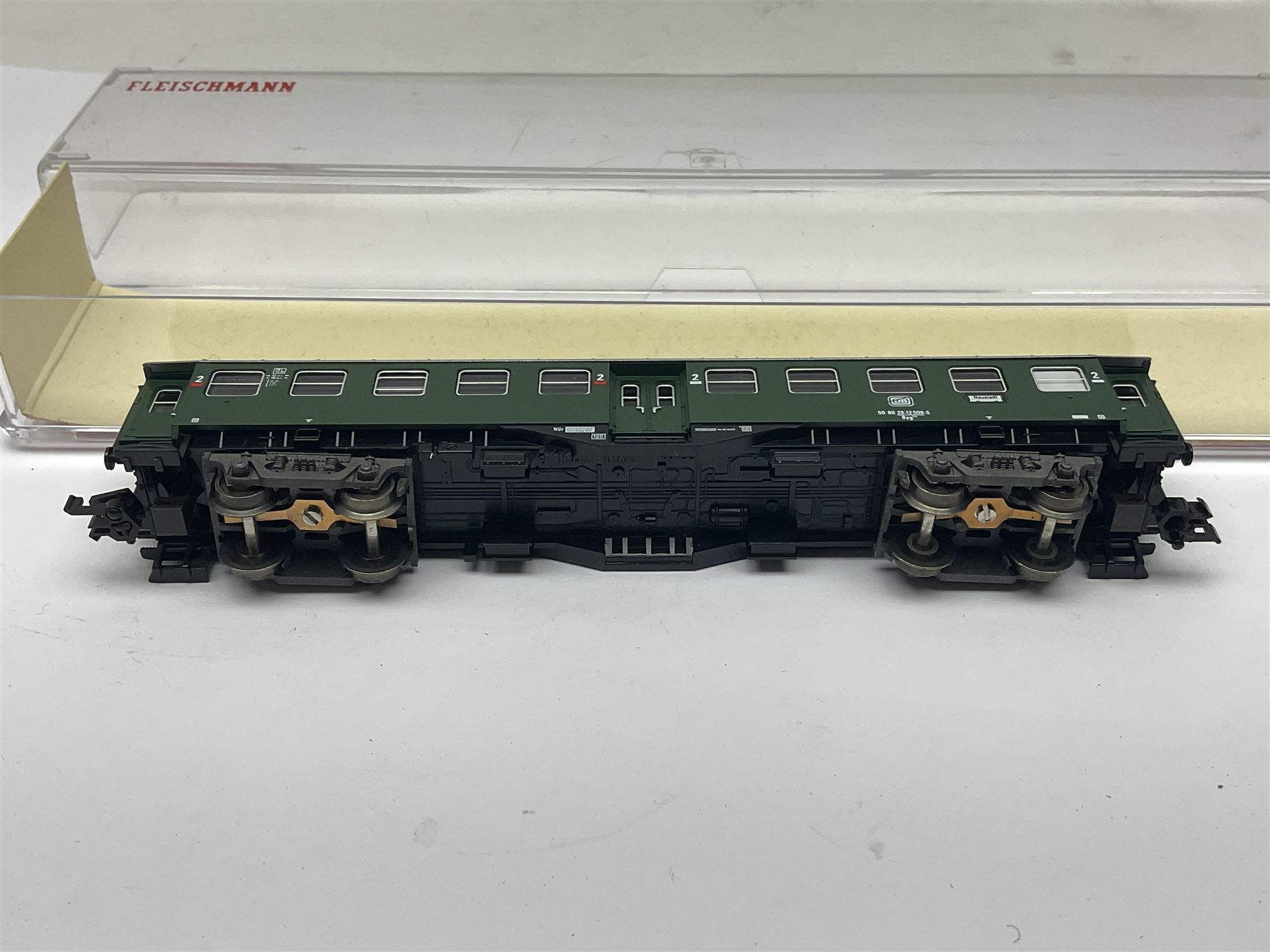 Fleischmann ‘N’ gauge ‘Piccolo’ - sixteen carriages, wagons and cars comprising nos. 8051, 8052, 8055, 8064, 8119K, 8127, 8128, 8129, 8202, 8211, 8224, 8240, 8281, 8301, 8500, 9372; along with Minitrix N503 Shock Van and 13576 6 ton Mineral Wagon; boxed and loose (18) 