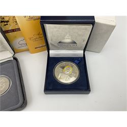 The Singapore Mint 2000 sterling silver proof one thousand five hundred Rs coin and an Australian Centenary of Federation 2001 three- coin set, both cased with certificates