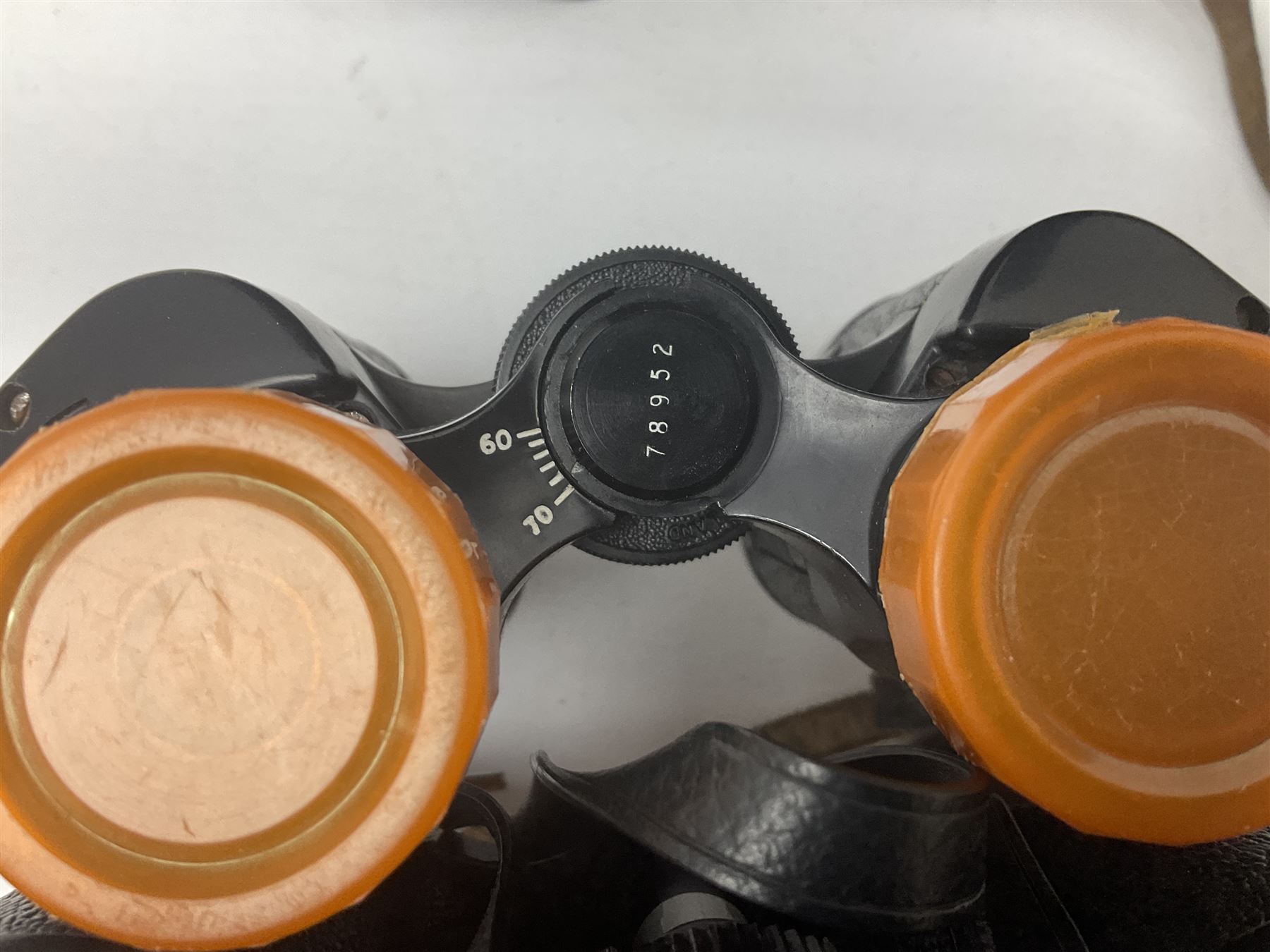 Ten cased pairs of binoculars, to include Ross London Steplux 7x50, Ross Solaross 16x60, Crescent zoom 7x- 12x50, Hilkinson 20x60,  Ross Stepnada 7x30,  Philo 10x50 etc