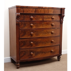  Victorian mahogany and oak bow front chest, two short and four long graduating drawers, turned supports, W122cm, H133cm, D61cm  