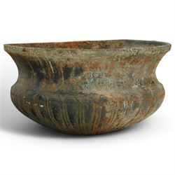 Victorian cast iron ‘lavabo’ lion's head wall fountain, the arched and crested backplate centred with a lion's head spout, with flanking scroll columns and gadrooned basin with flared rim

