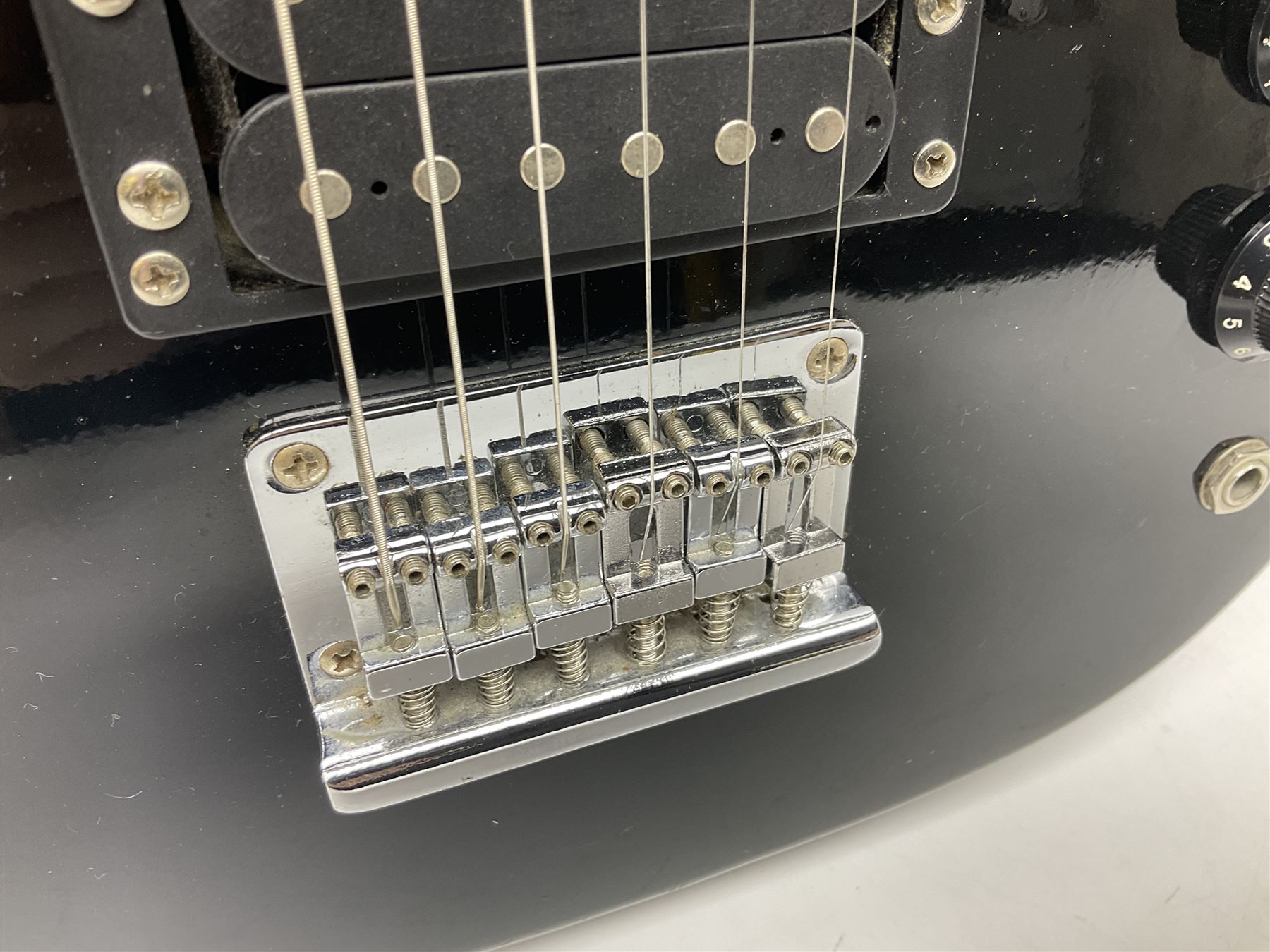 Encore black electric cut-away guitar L96cm; and Spanish Victor Garcia model 187 acoustic guitar, bears label dated 1972 L99cm; each in soft carrying case (2)