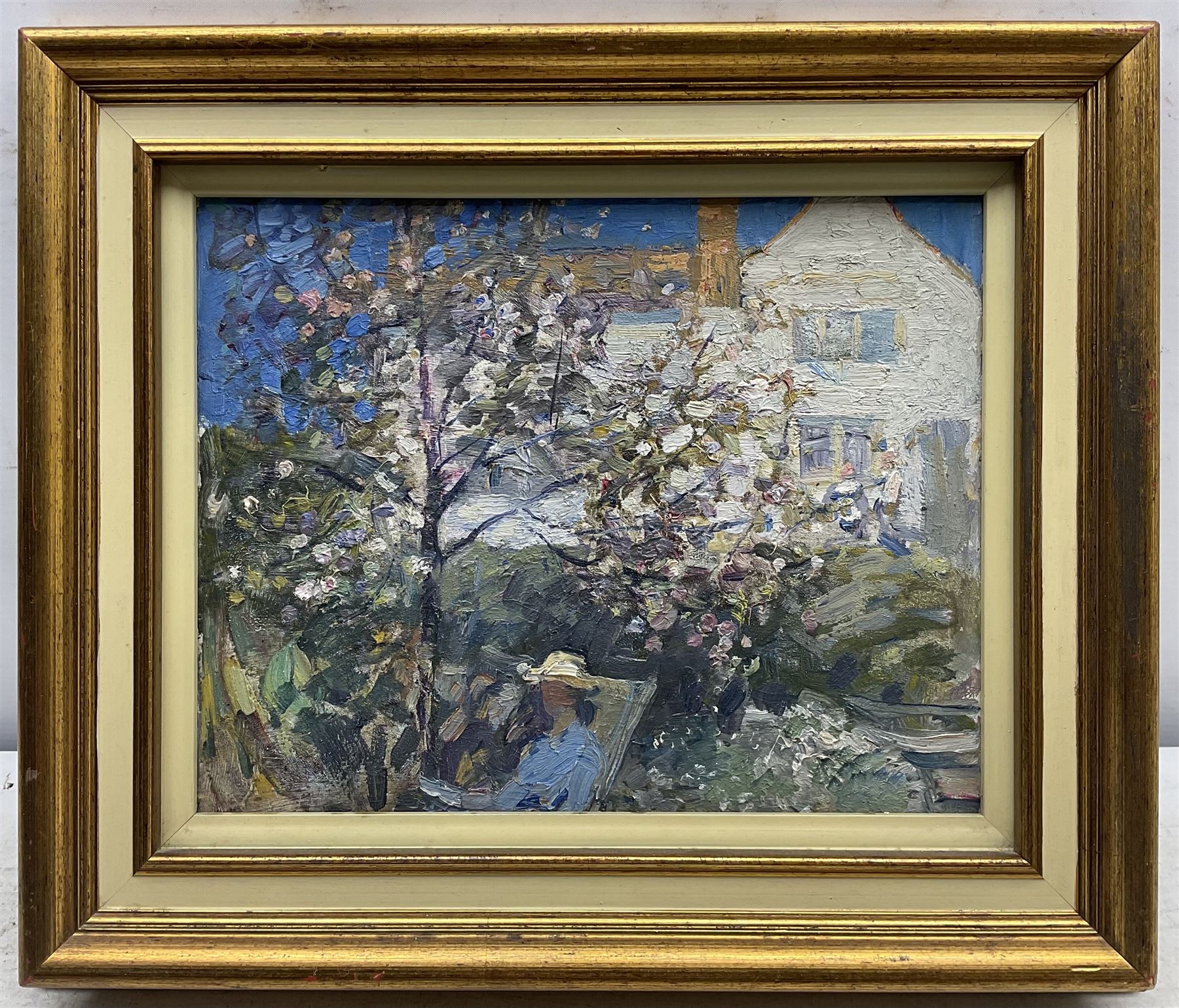 Mark Senior (Staithes Group 1864-1927): 'Blossom' - Lady in a Runswick Bay Garden, oil on panel, signed titled and inscribed 'To Mrs J Hepworth June 1919' verso 20cm x 26cm