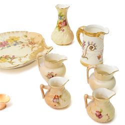 Large collection of miniature Royal Worcester hand-painted blush ivory wares, including various miniature baskets, large dish, miniature jug and others, with printed mark to bases