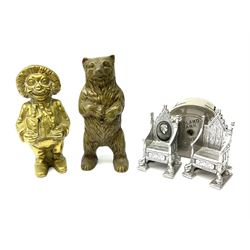 A group of vintage money boxes, to include a brass model of a standing Bear, H15.5cm, brass Clown, Midland Bank Limited money bank, and two 1953 Coronation Thrones marked 'Sixpenny Piece Bank'. (5).
