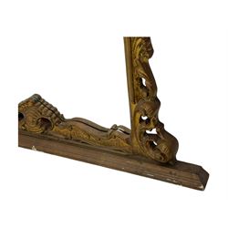 Victorian design gilt framed overmantel mirror, the arched and moulded frame adorned with scrolling foliate motifs and acanthus leaves, surmounted by a pierced cartouche, plain mirror plate, resting on a shaped base