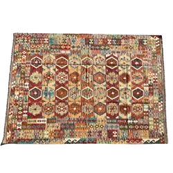 Anatolian Turkish Kilim multi-colour rug, decorated with all over hexagonal lozenges in contrasting colours, the multi-band border with repeating geometric shapes and small lozenges or diamonds