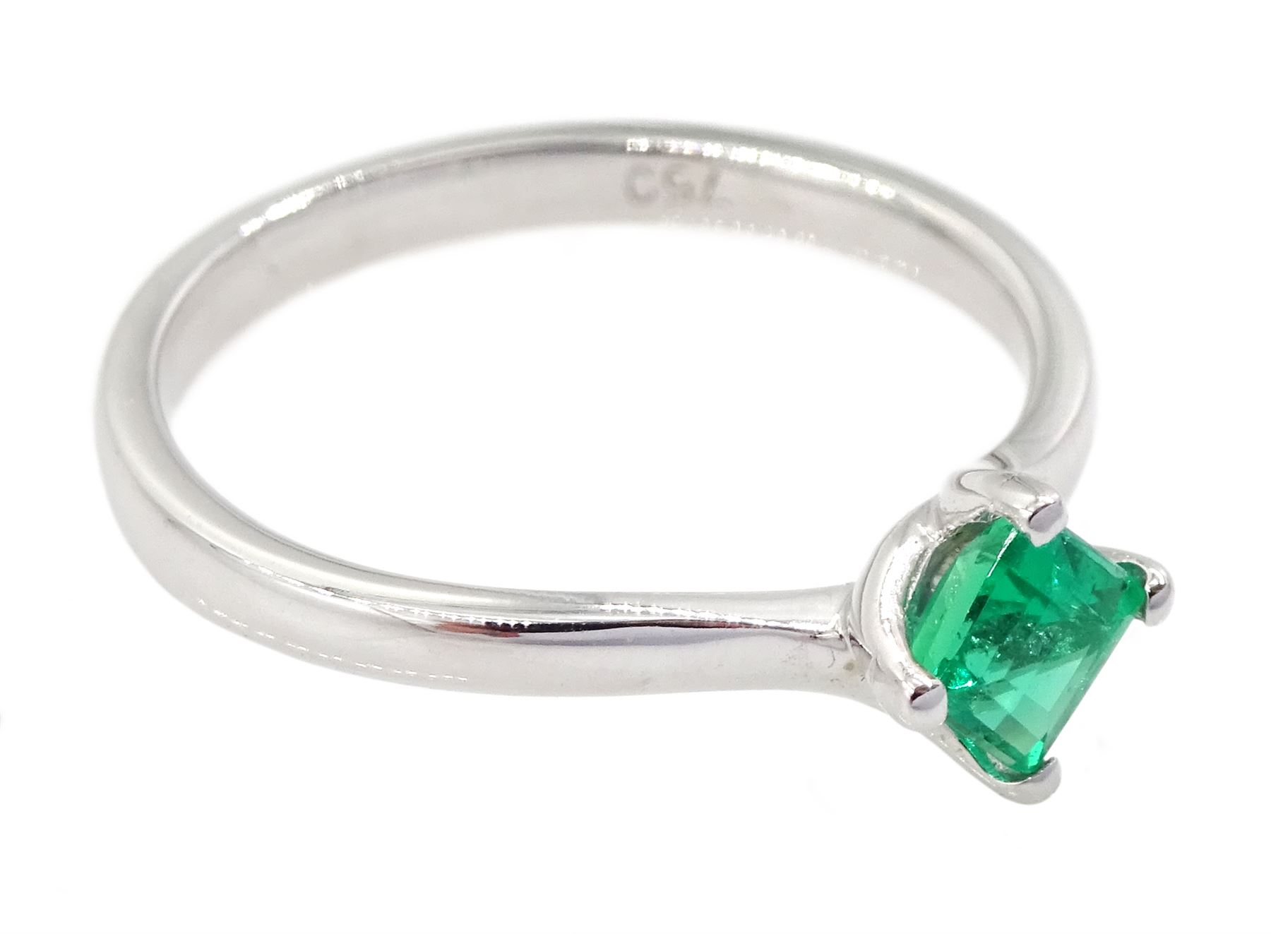 18ct white gold emerald ring, four claw set with a single square cut emerald of approx 0.30 carat, stamped 750