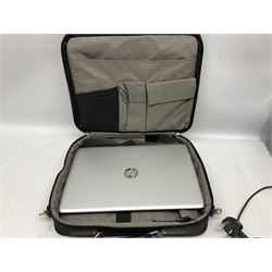 HP Pavilion Notebook 15 laptop with charger and Samsung video recorder in case